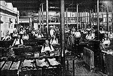 Picture of the clicking room in Cave's factory, 1923