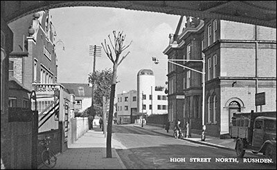 Picture of Birch Bros garage taken from underneath the railway bridge